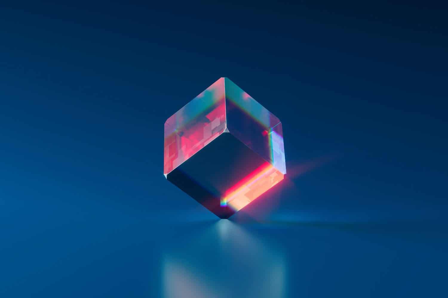 Futuristic glass cube with holographic reflections on blue background.